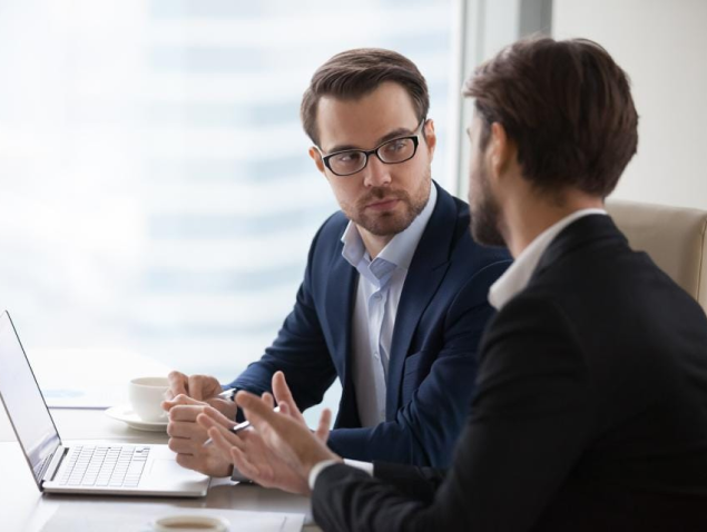 MBA consultants discussing with a client